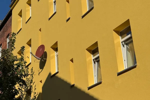 Sanierung der Fassade eines Mehrfamilienhauses in Erfurt